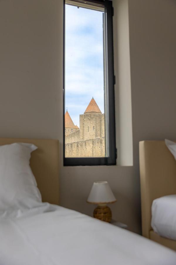 Sous Les Remparts La Maison Pimprenelle Carcassonne Exteriör bild